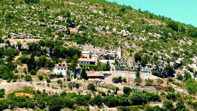 A view to the medieval Serbian monastery Zavala located in karst area in Herzegovin