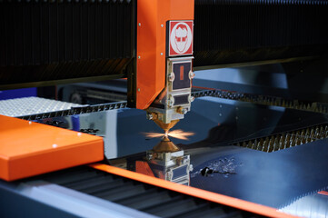 worker cutting steel