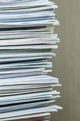 bundles bales of paper documents. stacks packs pile on the desk in the office
