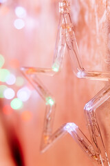 christmas festive garland on pink background.