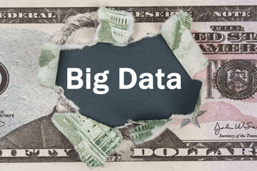 The dollar is torn in the center. In the center it is written - Big Data