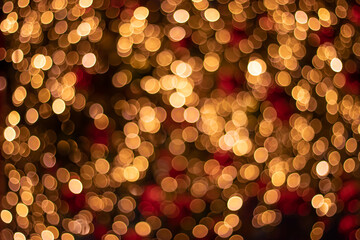 Bright blurry yellow-orange lights out in the form of bokeh