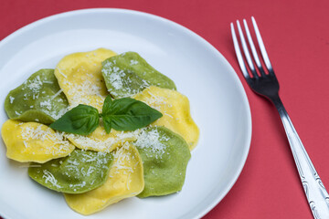 Ravioli with burrata and basil, Italian pasta top view