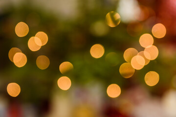Blurred Christmas bokeh lights. Abstract holiday background.