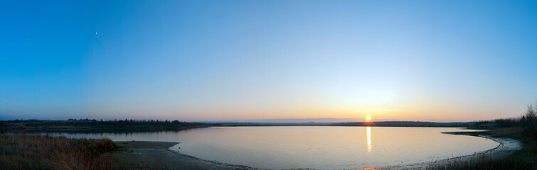 Panorama lake view in sunrise time /Sunrise at the lake