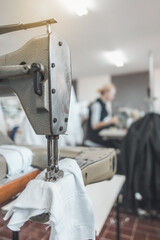 clothing industry workers working on sewing machines