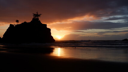 Cloudy sunset over the mountains and sea