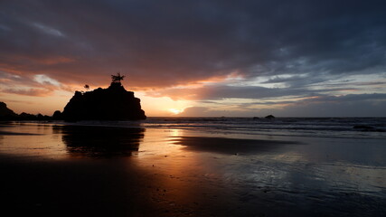 Cloudy sunset over the mountains and sea