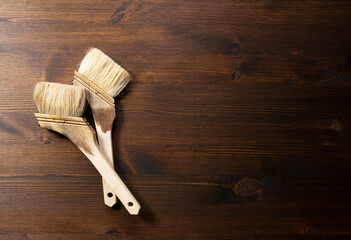 Oil stained wood board and brush