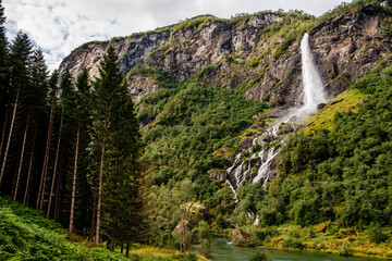 Fototapeta na wymiar waterfall in the mountains in norway flamsbana
