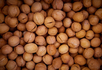 Top view of walnuts in nutshells.Healthy organic food concept.