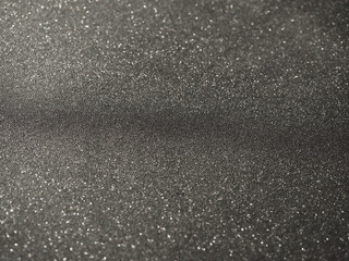 Black background with shiny white speckles