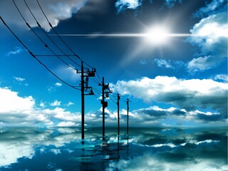 A mysterious landscape where the blue sky is reflected in the sea and utility poles disappear beyond the horizon	
