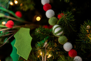 Fototapeta na wymiar Felted Christmas tree decorations 
