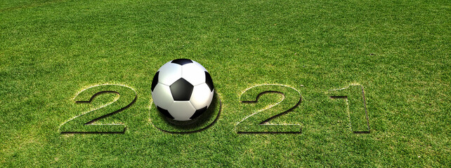 芝に浮きあがった2021の数字とサッカーボール © k_yu