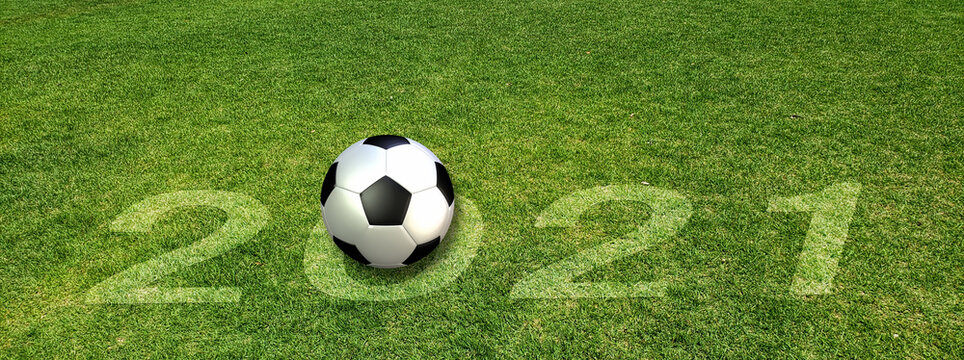 芝に描かれた2021の数字とサッカーボール
