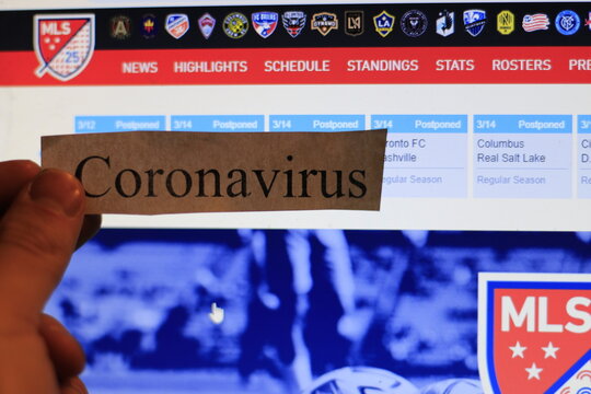 London Canada, MArch 12 2020: editorial illustrative photo of coronavirus or covid-19 in front of MLS website. 