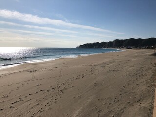 Hebara Beach in Katsuura, Chiba, Japan during the winter months, the Pacific Ocean is very blue with a nice clean white sand beach. There are no people on this stunning coastline due to Covid in 2020