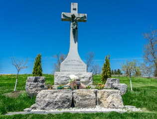 Tombstones and Cross at the St. Patrick Irish Catholic Church cemetery constructed in 1830 in...