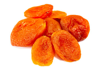 Delicious appetizing dried apricots on a white background