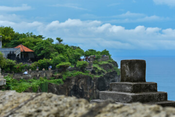 Fototapeta premium Beautiful temples and beaches in bali - Uluwatu Temple, nusa penida kelingking beach, uluwatu, pandava beach, tanah lot, kuta beach