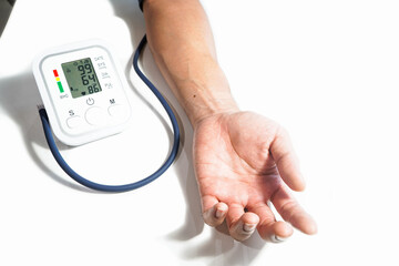 Men's health check blood pressure.and heart rate with digital pressure gauge standard blood pressure test results .Health and Medical concept
