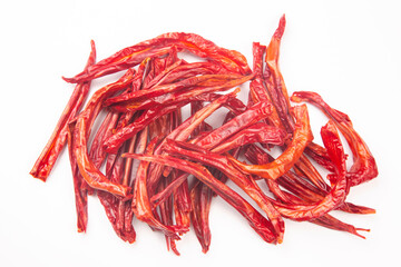 red dried hot peppers on white background