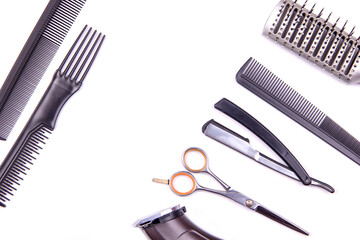 Fototapeta premium professional hairdressing tools laid out on the table top view