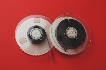 Naklejka premium Roll of Film. Tape roll with red background