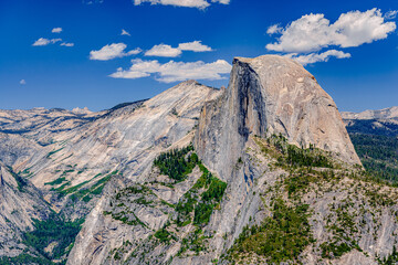 half dome with clouds