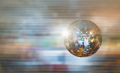 Party disco mirror ball reflecting colorful  lights 