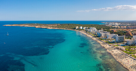 An aerial view on Cala Millor beach on a sunny day at Mallorca island in Spain