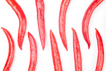 Red hot chili peppers on a white background. Vitamin vegetable food