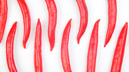 Red hot chili peppers on a white background. Vitamin vegetable food