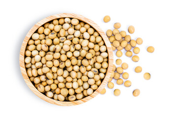 Soybeans in wooden bowl isolated on white. Top view. Flat lay.