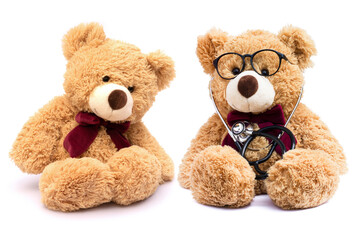 Brown doctor teddy bear with eye glasses and medical stethoscope  with patient isolated on white background.