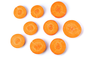 Fresh organic sliced of carrot isolated on white background. Top view. Flat lay. 