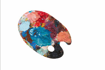 Artist's palette with different colors isolated on a white background