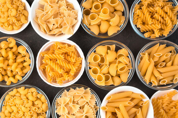 Pasta assortment, top view, with space to copy. Product concept, culinary backgrounds.