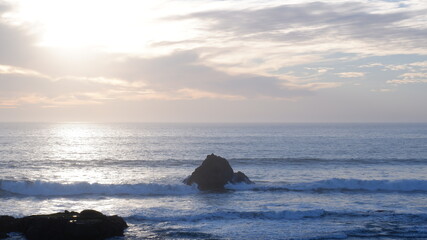 Fototapeta na wymiar Rocks and ocean waves