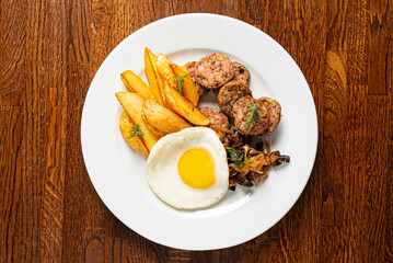 breakfast with fried egg and sausage