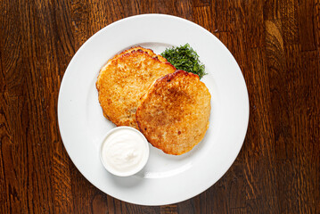 potato pancakes with sour cream