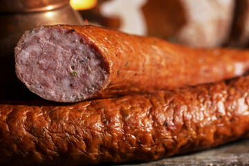 Smoked sausage on the table.