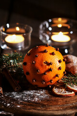 Orange pomander ball. Tradittional Christmas decoration.