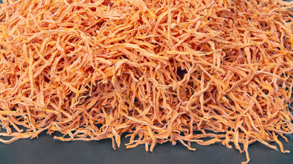 dried carrot slices. vegetables and vitamins. healthy food. food background and texture.