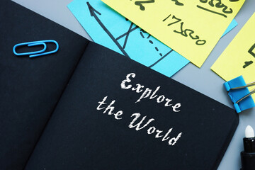 Business concept meaning Explore the World with inscription on the sheet.