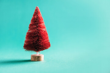 Zero waste Christmas tree on blue background. Minimal concept. Copy space for your design