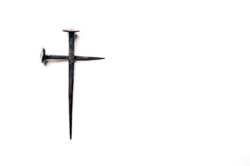 Cross made with rusty nails and drops of blood on white background. Copy space. Good Friday, Easter day. Christian backdrop. Biblical faith, gospel, salvation concept. Crucifixion of Jesus Christ - 401487101