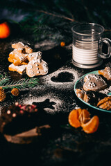 New Year and Christmas cookies with milk and tea