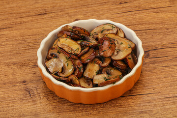 Roasted champignon with herbs and spices